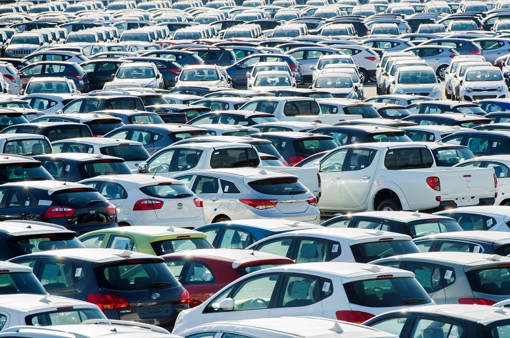 TUSCANY, ITALY - 27 June: New cars parked at distribution center